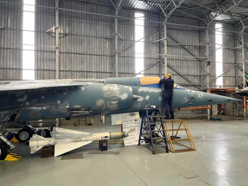 SAAF Mechanic repairing aircraft