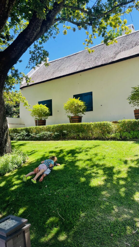 Neethlingshof Kids playing on the lawn