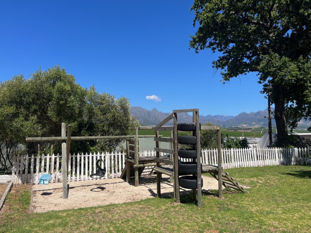 Neethlingshof Playground with mountains in the back